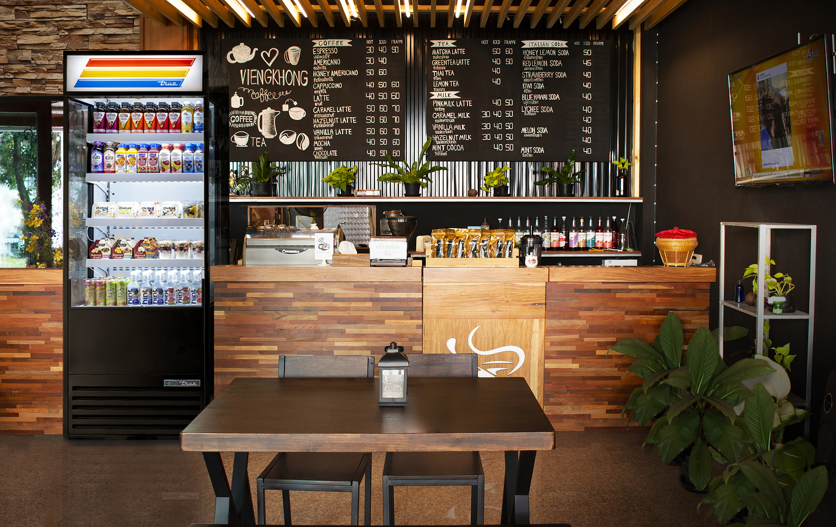 MUKDAHAN, THAILAND - OCTOBER 2 : Interior decoration furniture of cafe coffee shop with staff barista brew make coffee serve customer  at luxury coffee shop on October 2, 2019 in Mukdahan, Thailand
