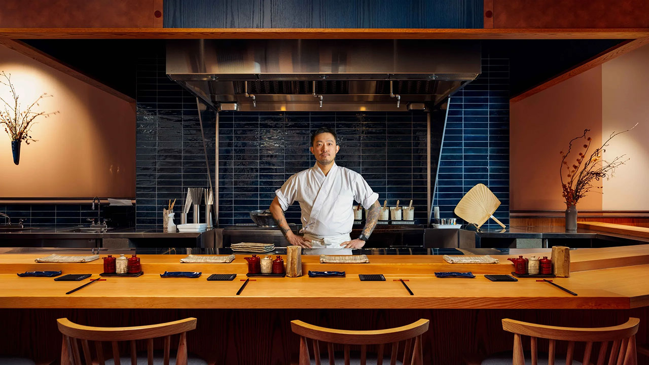 Chef Pete stands at his Michelin Star restaurant bar. Photo: Conrad Brown